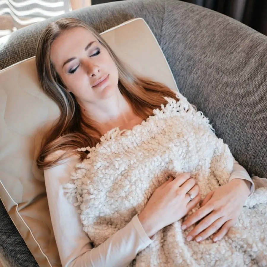 Woman resting relaxed with her eyes closed