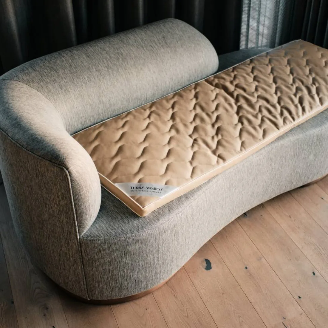 The BETTER³ Regeneration System on a sofa